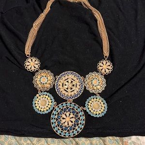 Large gold focal piece necklace
